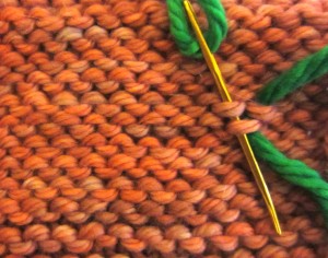 Follow your yarn around the curve.